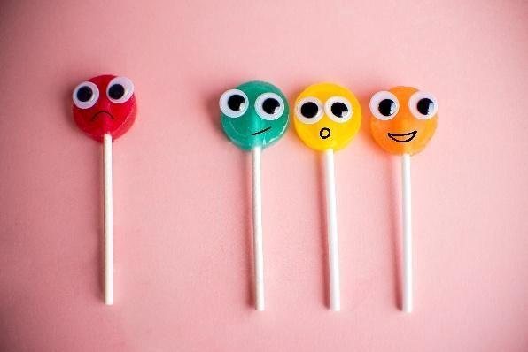 Round hard candy on sticks — a common choking hazard for young children.